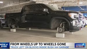 GMC Sierra Has Its Wheels Liberated In Airport Parking