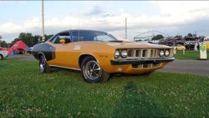Childhood Memories Revved Up: Woman Continues Legacy with Her Inherited '71 Plymouth 'Cuda