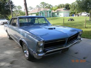 Numbers-Matching 1965 Pontiac GTO Headlines as a Featured Lot at Carlisle Auction