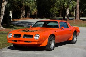 Unrestored 1976 Pontiac Trans Am in Rare Carousel Red Stuns on the Market