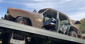Rusty 1950s Dodge Coronet Rescued from Field Carries an Eerie Mystery
