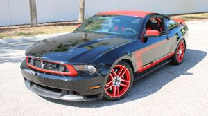 This 4,200-Mile 2012 Ford Mustang Boss 302 Laguna Seca Is A Track-Bred Pony Car Signed By Parnelli Jones