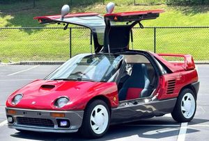 This 1994 Suzuki Cara Is a 531-Unit Gullwing Kei Coupe Bidding on Cars & Bids
