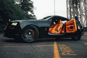 No-Reserve 2020 Rolls-Royce Wraith With Custom Orange Interior Carries a Rebuilt-Title Backstory on Cars & Bids