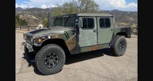 This Modified 1993 AM General M998 Humvee Is Chasing Bids on Cars & Bids