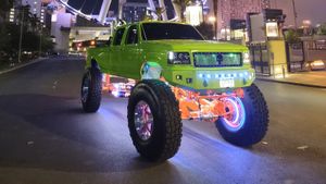 SEMA-Built 1994 Ford F-350 on 54-Inch Tires Brings Its Own Dance Floor to Mecum Las Vegas