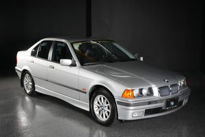 Who Saves a Base-Model E36? This 16k-Mile 1998 BMW 318i Is Live at No Reserve on BaT