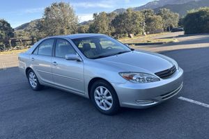 69,000 Miles, One Owner, and an Airbag Label Mom Never Peeled Off: This 2002 Camry V6 Is Live on BaT