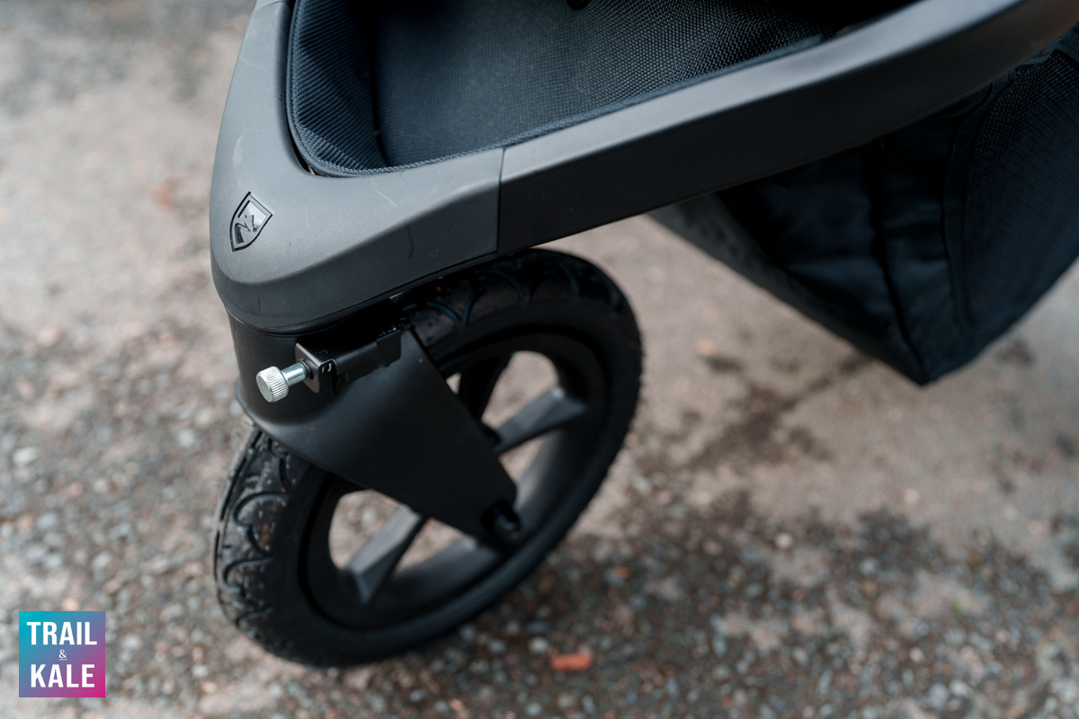 Adjust the front wheel's tracking using the silver knob.