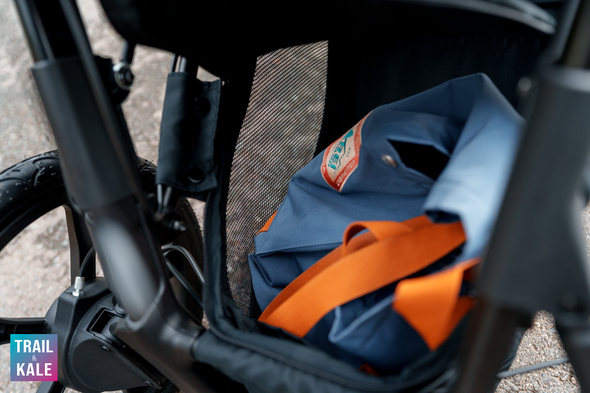 Large cargo storage basket underneath the occupant, which is easier to access from the front of the BOB Wayfinder stroller than the back.