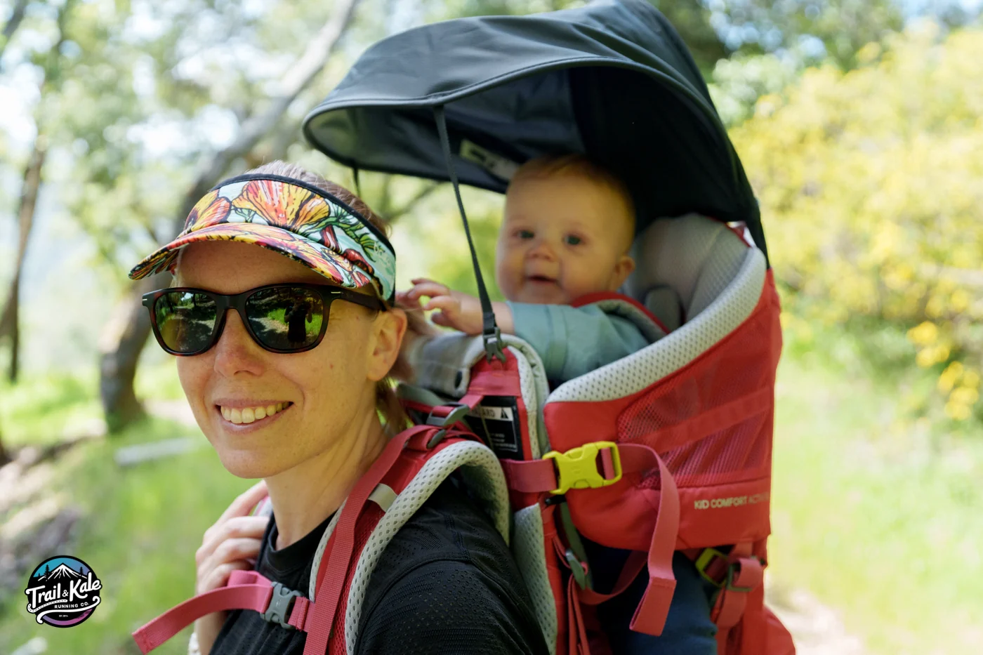 My baby enjoying the views and playing with my hair in his Deuter Kid Comfort child carrier. You can see the soft grey chin rest in this picture.