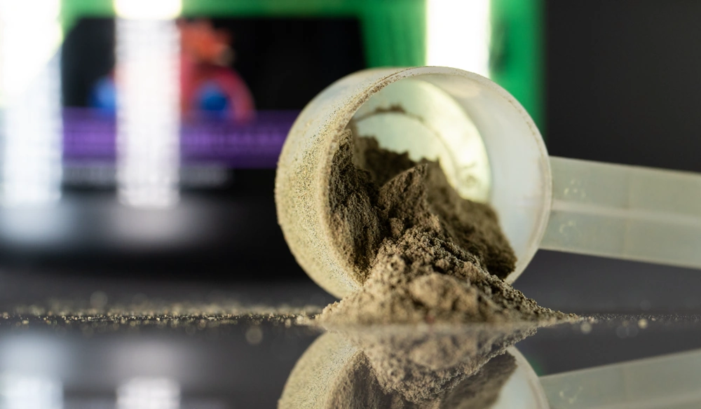 GNC AMP Amplified greens powder granules closeup