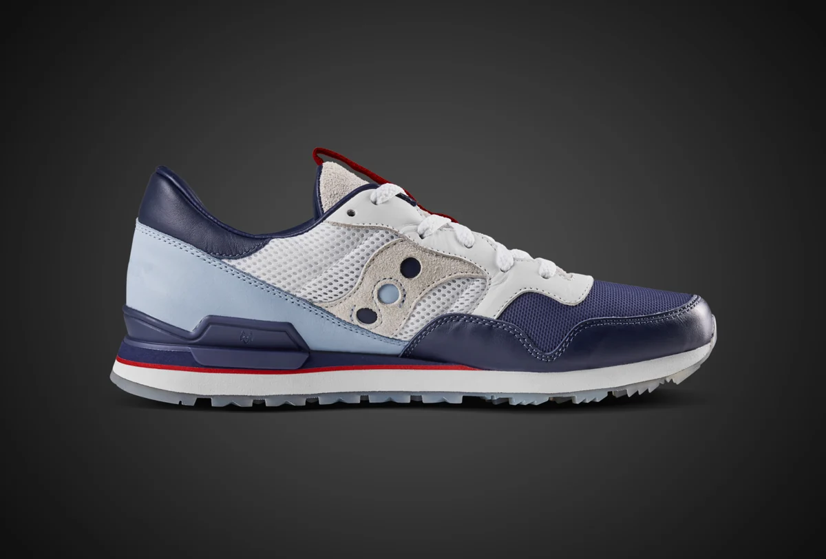 Greyson and Saucony DXN Courageous side view