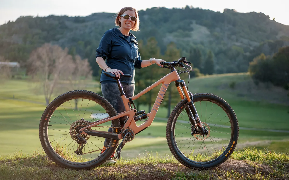 Helen standing next to her Juliana mountain bike