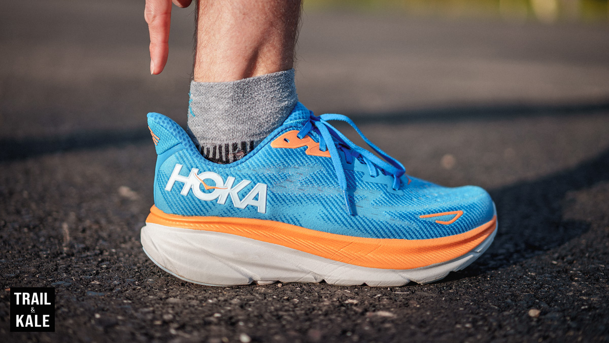 Me pointing at the articulated heel design on the Clifton 9