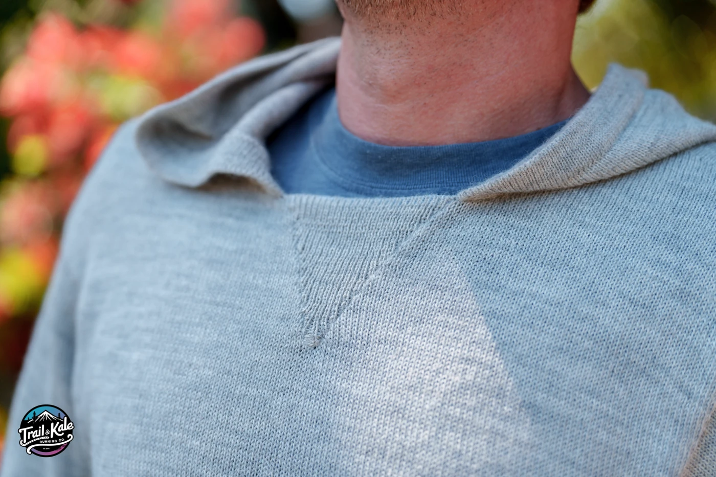 Close-up of the v-neck detail on the PAKA Hoodie