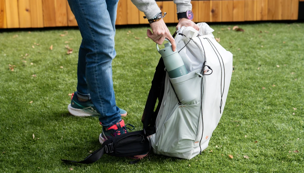 I find my bottle is hard to access unless I remove the pack, as its placement is high