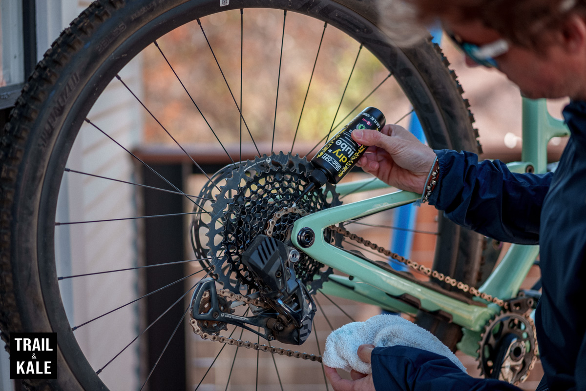 Remember to hold an old cloth or towel to catch any grime or lube that may drip from the chain