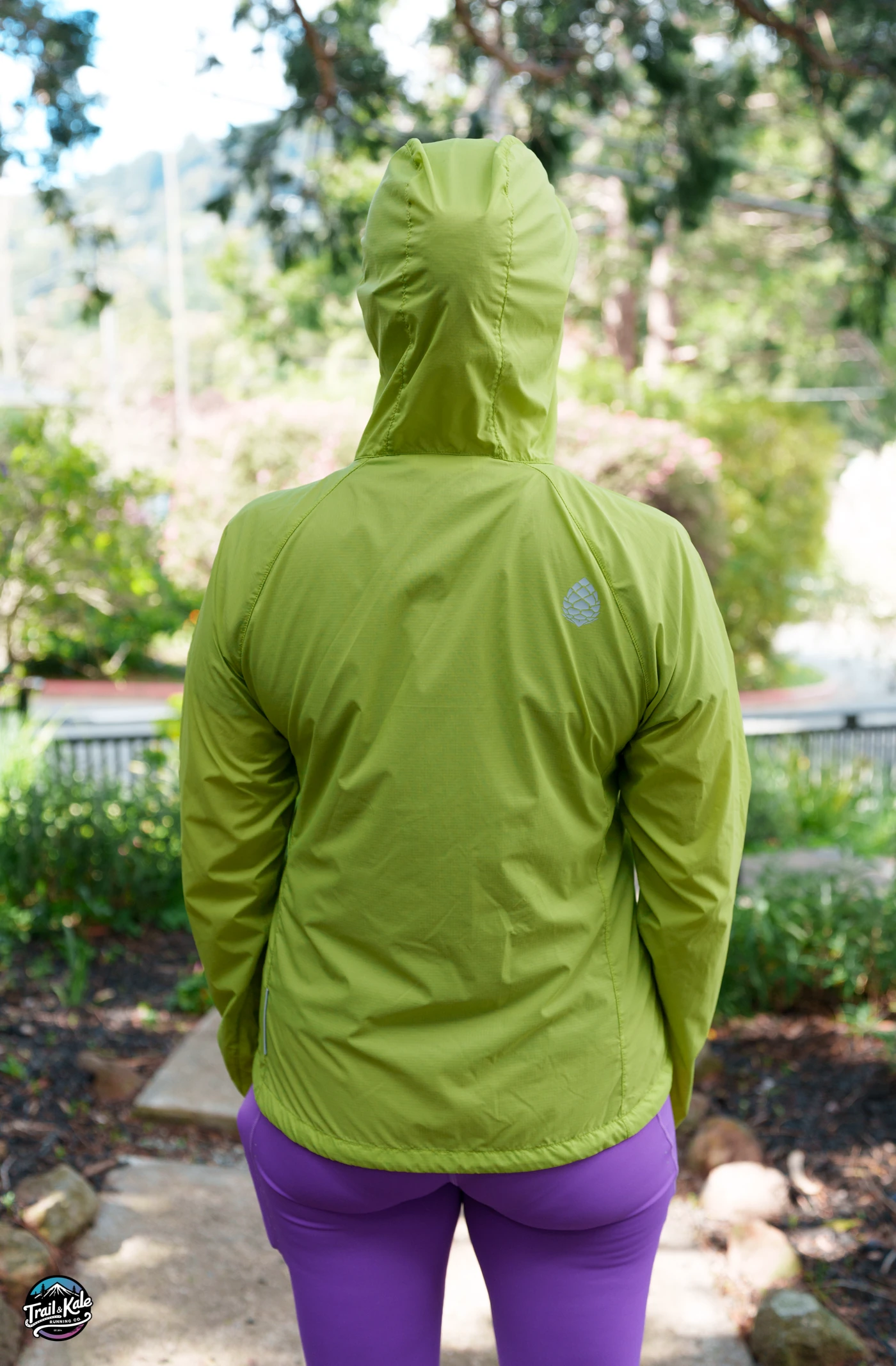 The rear of the Stio Second Light Windshell, complete with reflective pine cone detail