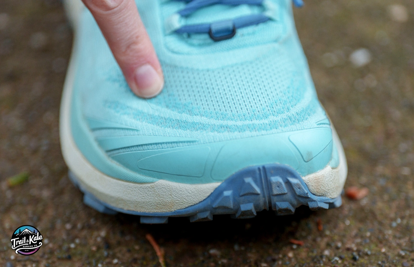 A close up of the Topo Pursuit 2's mesh upper, protective toe box and wrapover outsole on the running shoe's toe