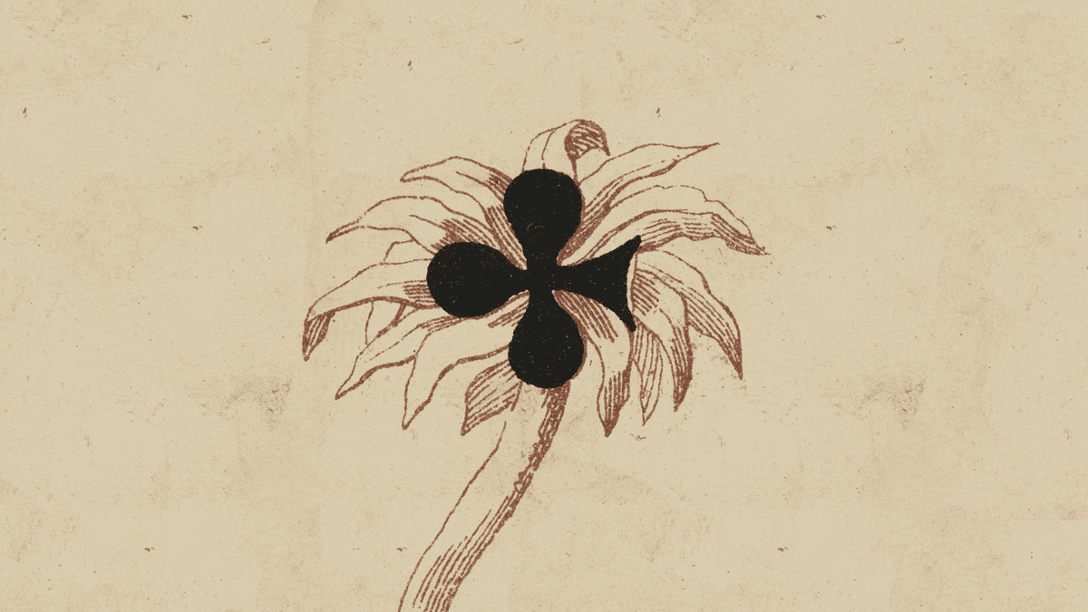 A black club symbol over a delicate flower drawing on cream paper.