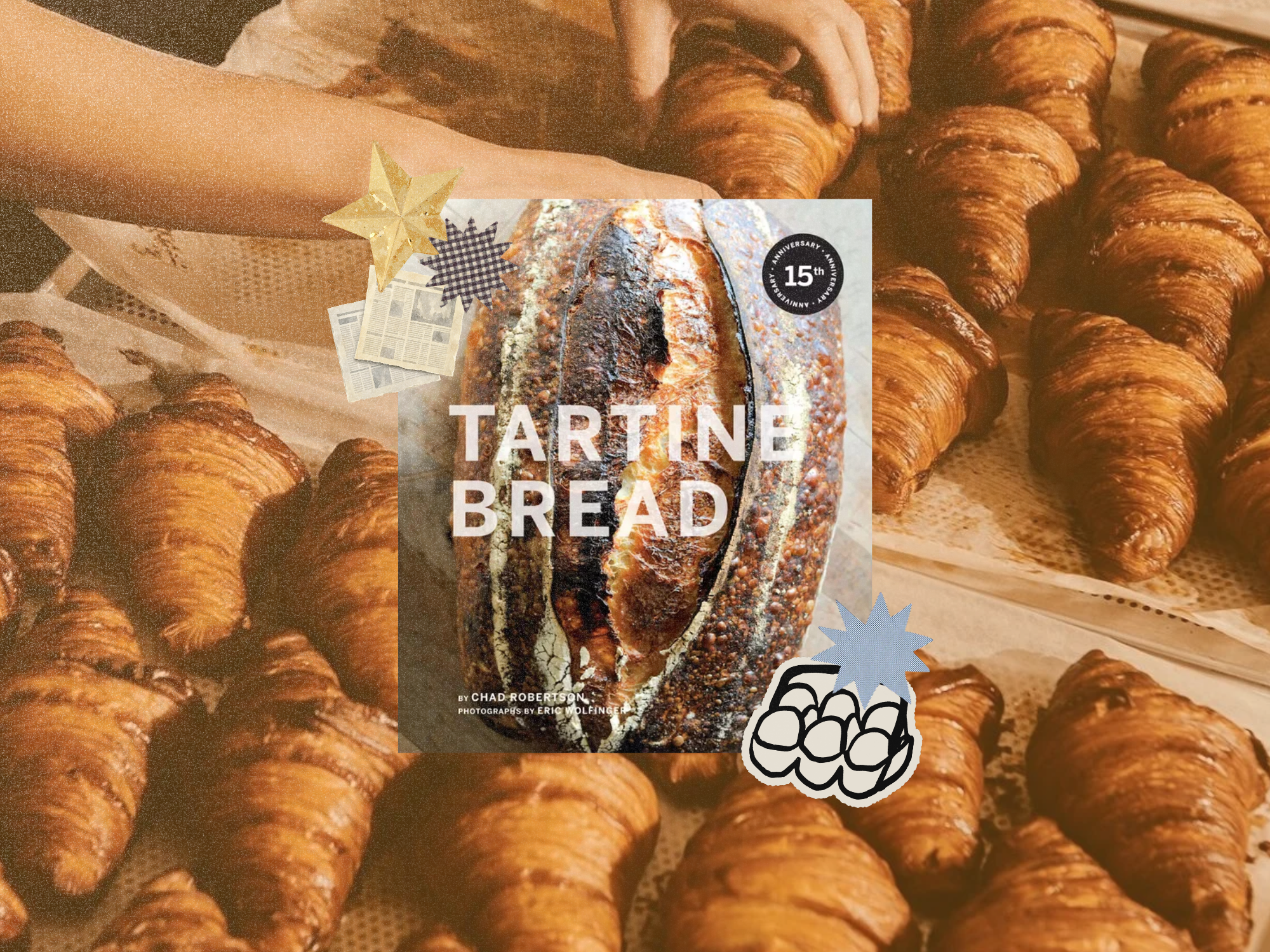 Tartine Bread by Chad Robertson cookbook cover collaged over a tray of croissants with gold star and blue starburst stickers