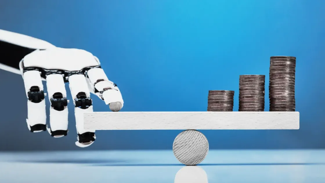 A robotic finger presses one end of a wooden seesaw while the opposite end rises under growing stacks of money, symbolising how cost-cutting automation can inflate expenses instead.