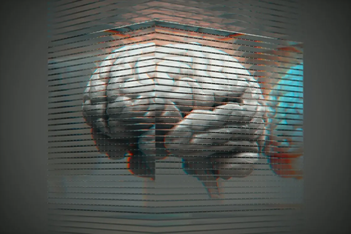 3D illustration of a human brain inside a sliced glass cube, suggesting how screens and AI are reshaping human cognition.