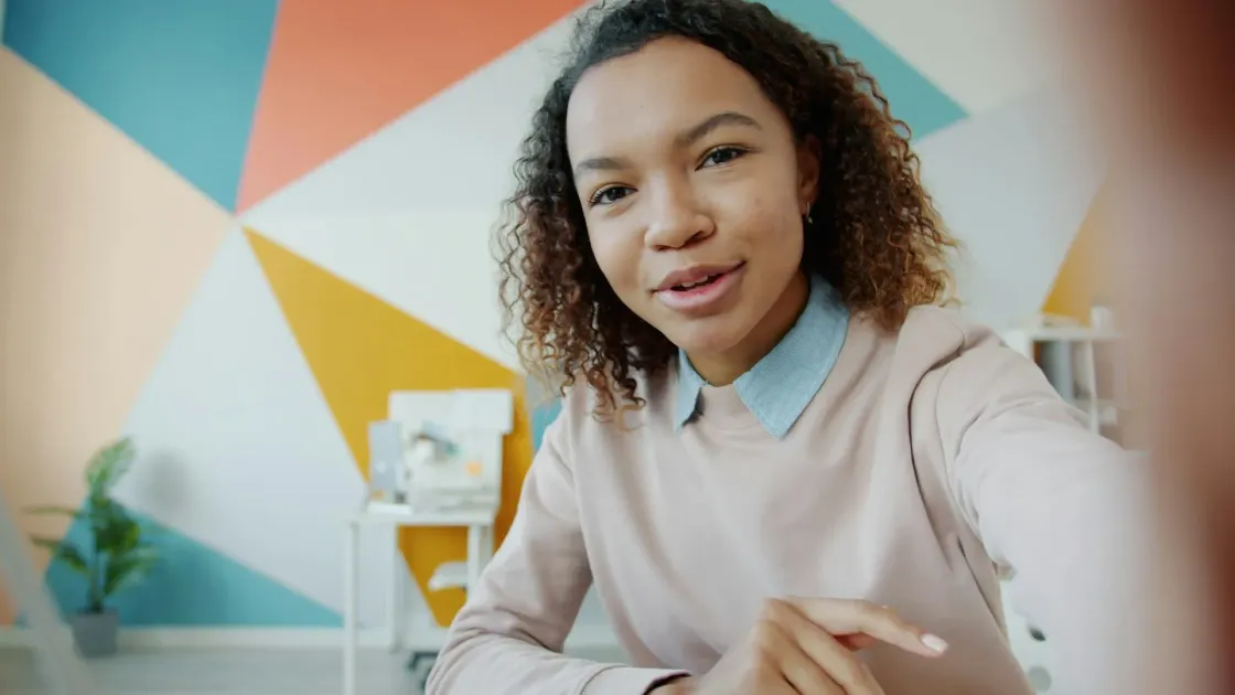 Employee creating video content, illustrating employee generated content and authentic employer branding.