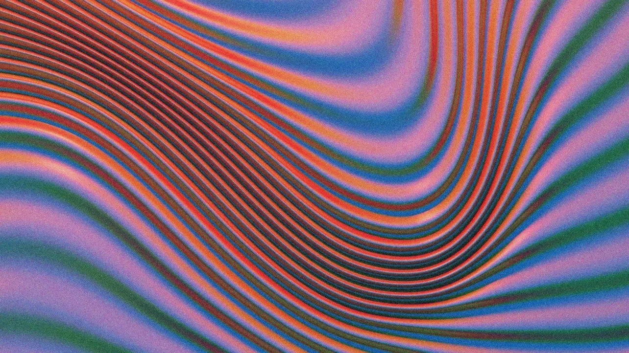 Abstract flowing wave pattern in vivid colors, symbolising disruption and momentum in employer branding.