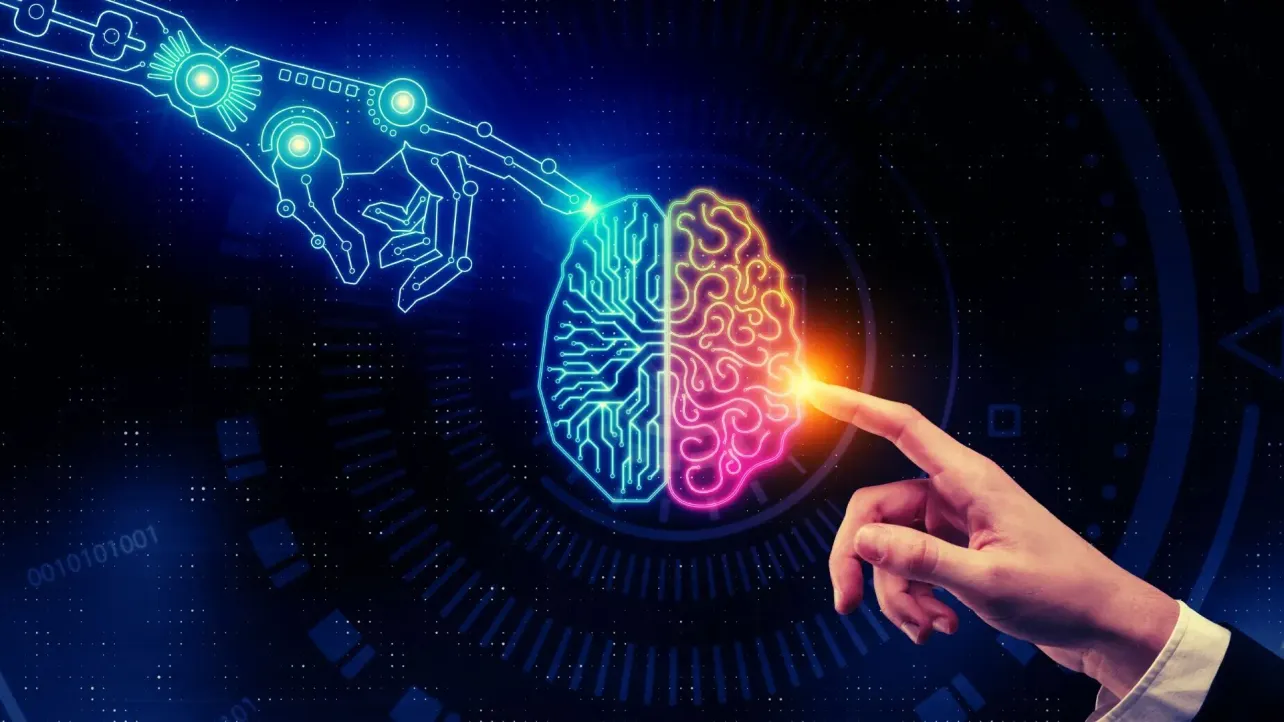 Illustration of a robotic hand and a human hand touching opposite sides of a glowing digital brain, symbolising collaboration between AI agents and human intelligence at work.