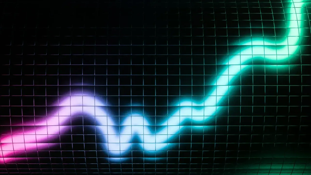 Neon signal wave on a dark grid transitioning from magenta to teal, representing the shifting market forces reshaping employer branding strategy in 2026.