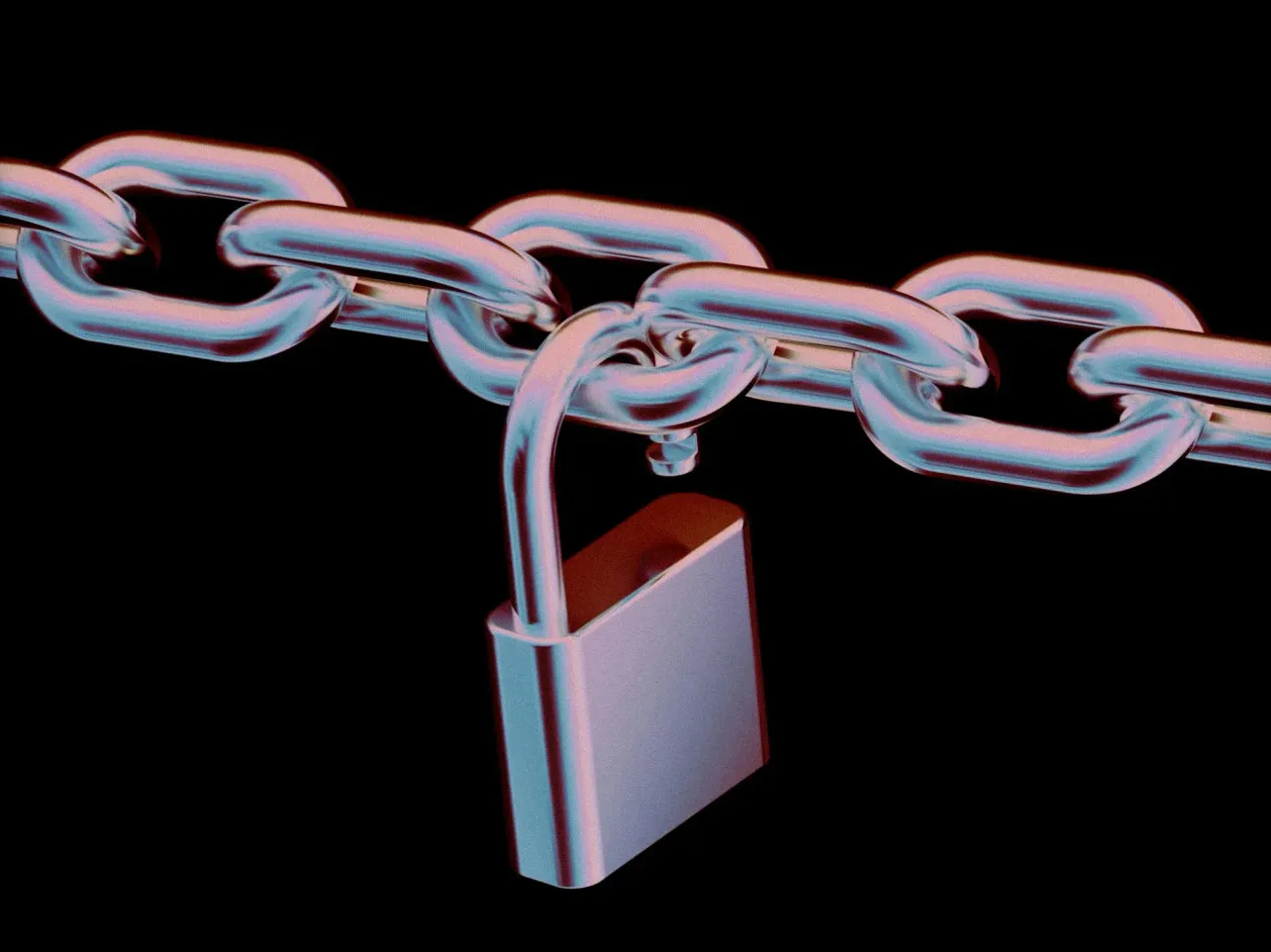 An open padlock hangs from a heavy chain against black, lit in cool blue and warm pink, the binding visibly undone.