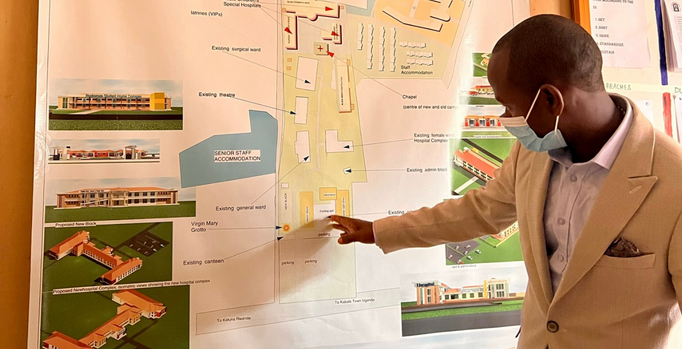 Watsi's medical partner team walking Sydney through the master plan