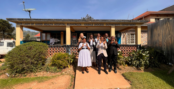 A groupd photo of the amazing team at Rushoroza Hospital providing care to patients in Uganda