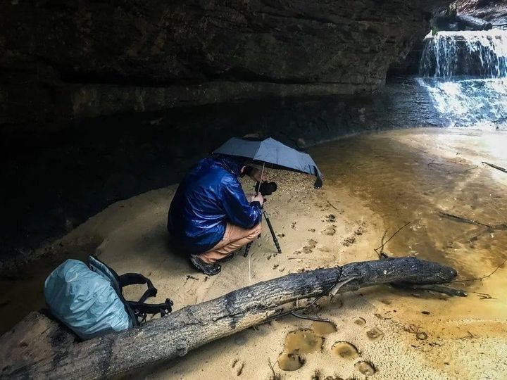 Adam Thompson photographing Creation Falls in the Red River Gorge, Kentucky.