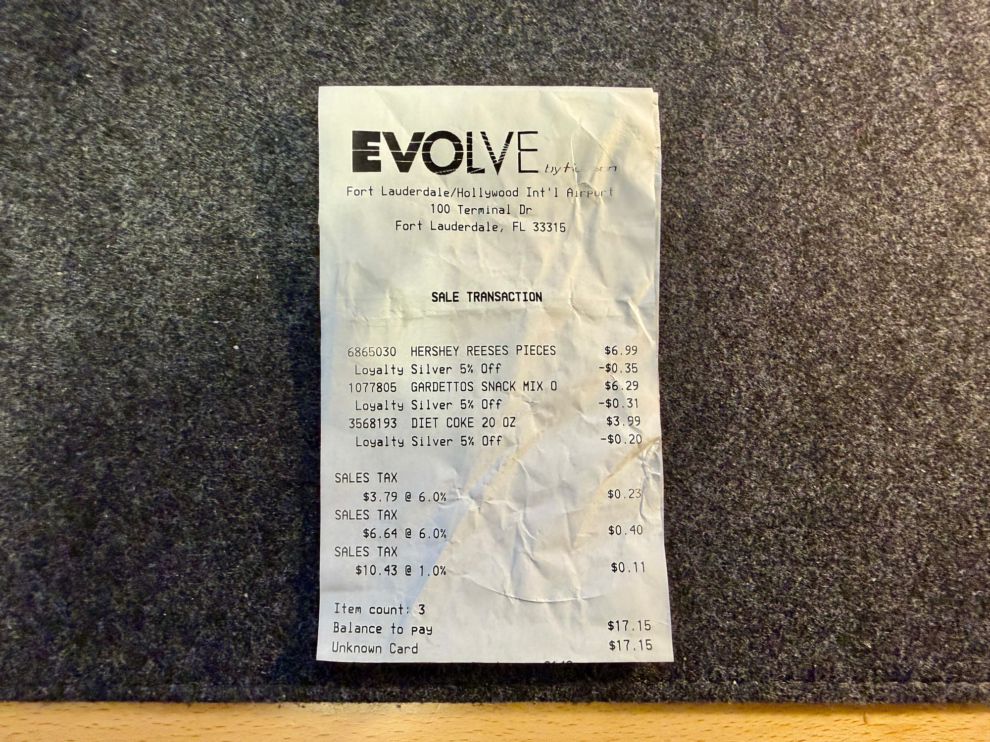 Hudson News Recept from an Evolve shop in Fort Lauderdale with Club Avolta savings