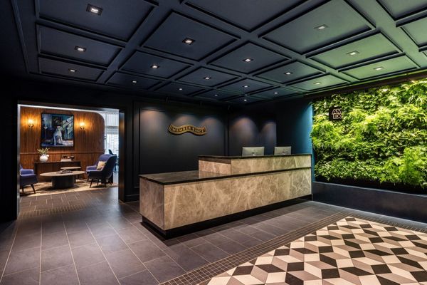 Entryway to the Centurion Lounge at Amsterdam Schiphol Airport.