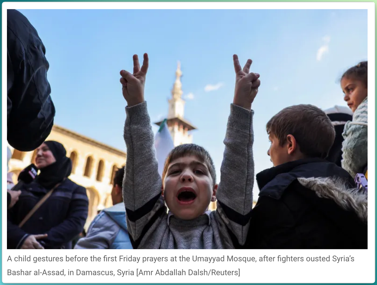 Syria Rejoices, WTF is Flying Over NJ & the Year in Photos