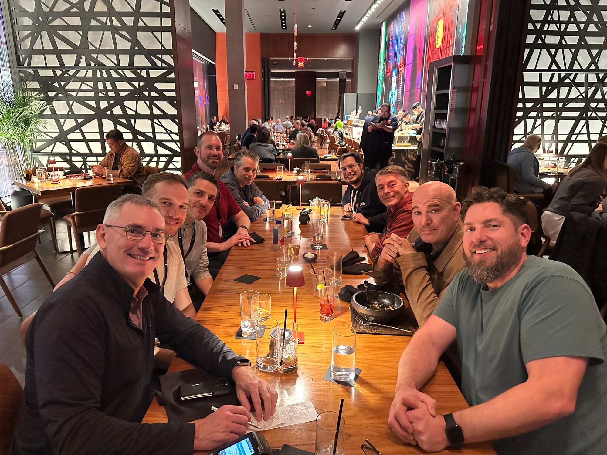 Picture of a bunch of people sitting down at a restaurant