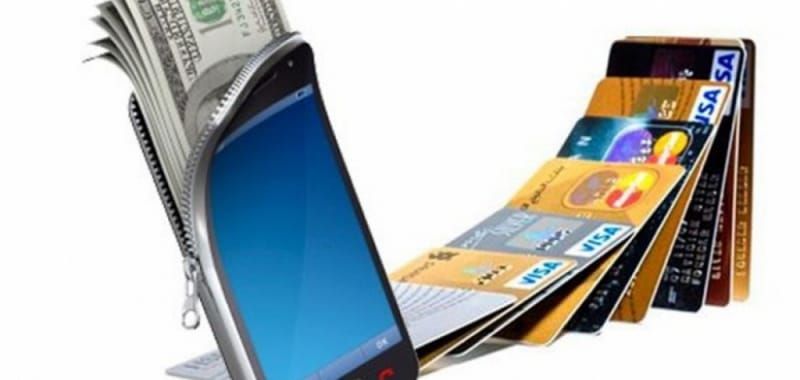 "Сатып алуу жүгү": эмне үчүн банк карталары көбүрөөк акча коротууга мажбулайт