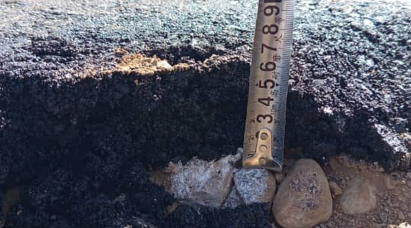 Жети-Өгүздө талапка жооп бербеген асфальт буздурулду