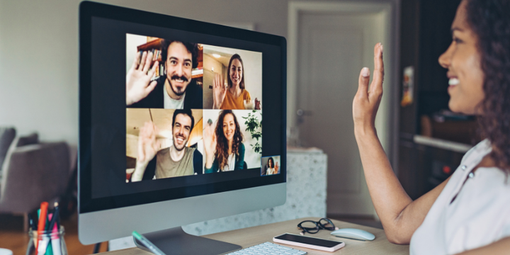 Instructor facilitating an interactive online class with engaged adult learners.