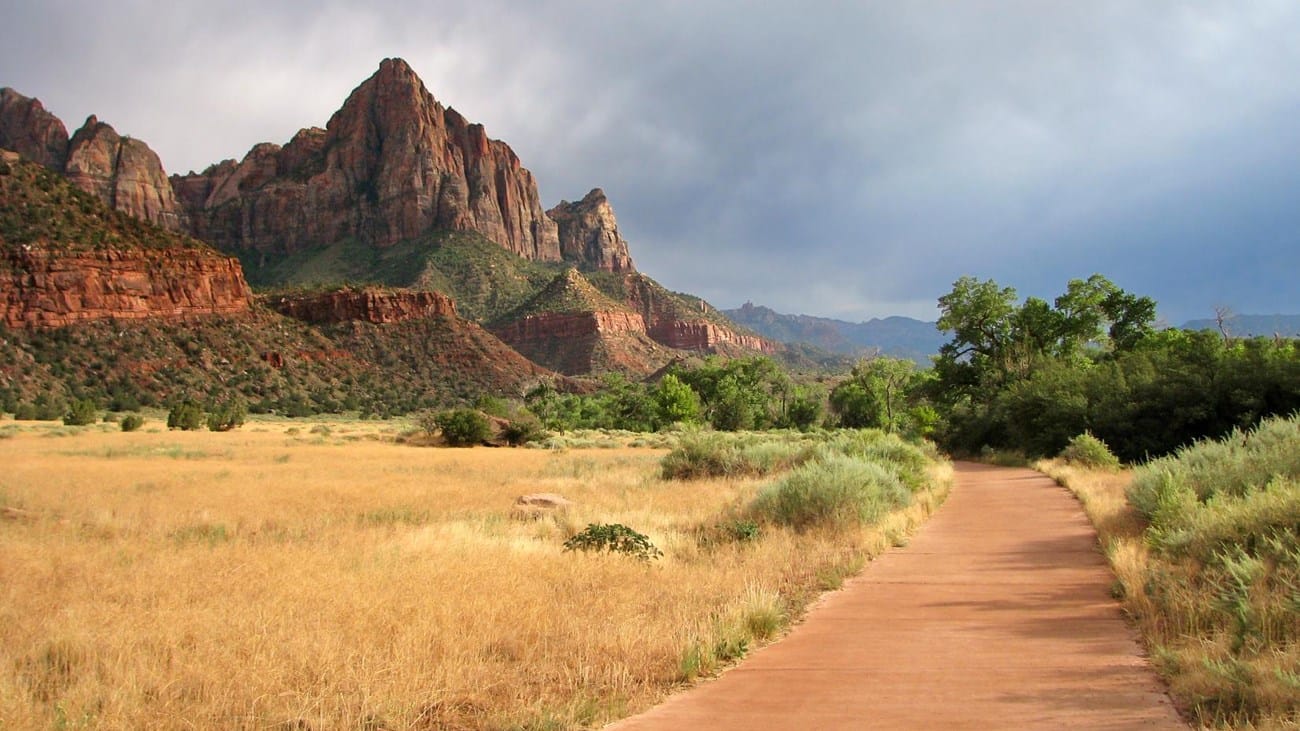 Paved Pa'rus Trail in Zion National Park, Utah, offering a wheelchair-friendly route through Zion Canyon with views of the surrounding sandstone cliffs.
