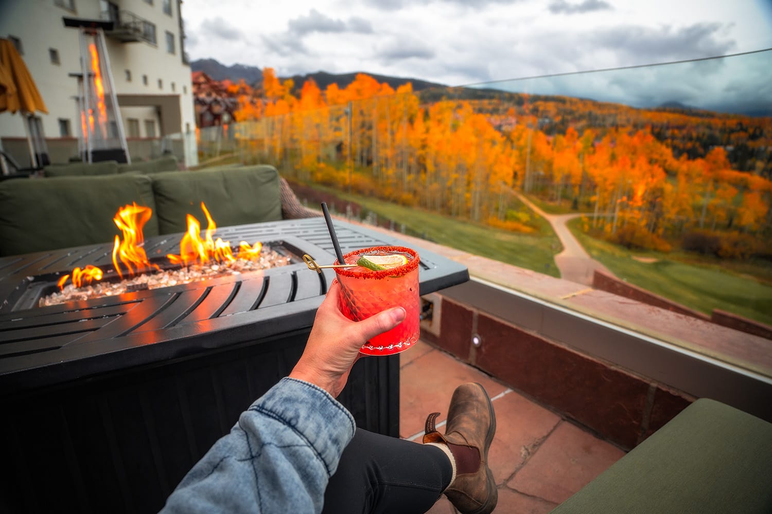 BONUS: Grab a Spicy Watermelon Margarita from the Peaks Resort bar and sit on the patio by the fire overlooking Wilson Peak in Telluride, Colorado. © Roaming the Southwest.