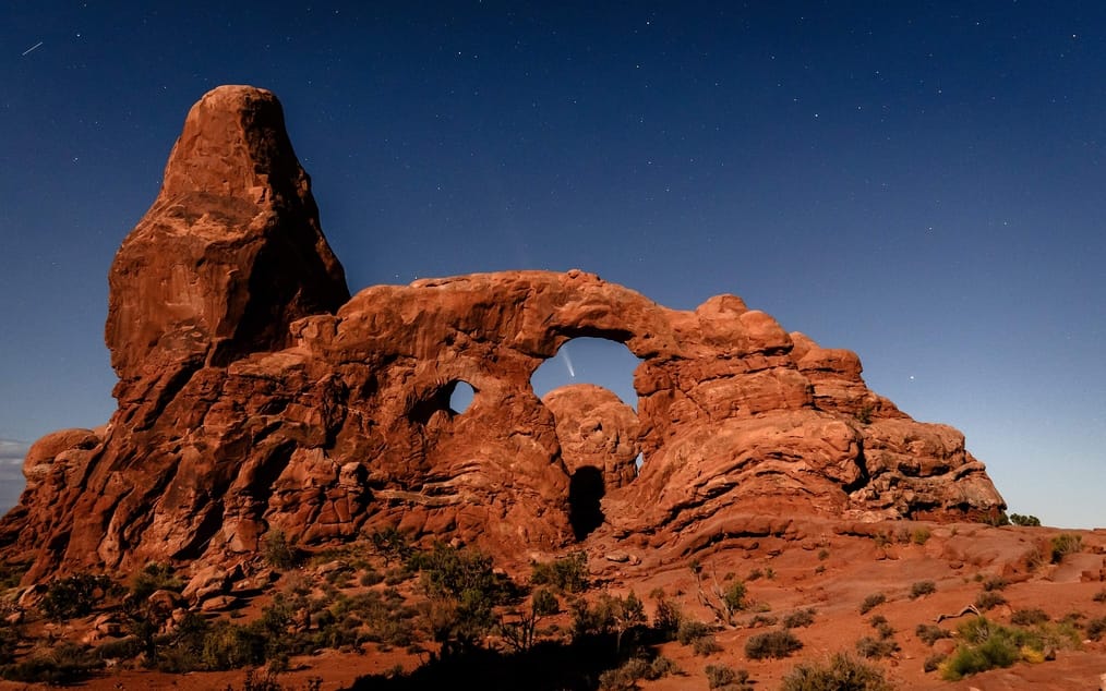 Comet Tsuchinshan–ATLAS (C/2023 A3) photographed through Turret Arch in Arches National Park in October 2024. © Roaming the Southwest