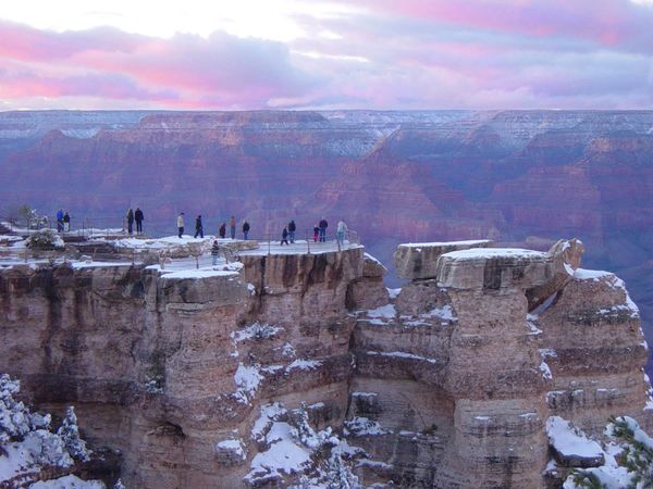 Sunset over the Grand Canyon from Mather Point, a wheelchair-accessible overlook on the South Rim with paved pathways and expansive canyon views.