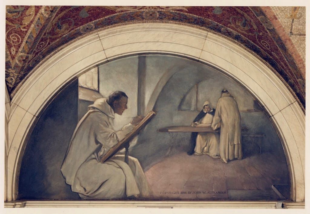 A monk sitting at a desk, copying a manuscript