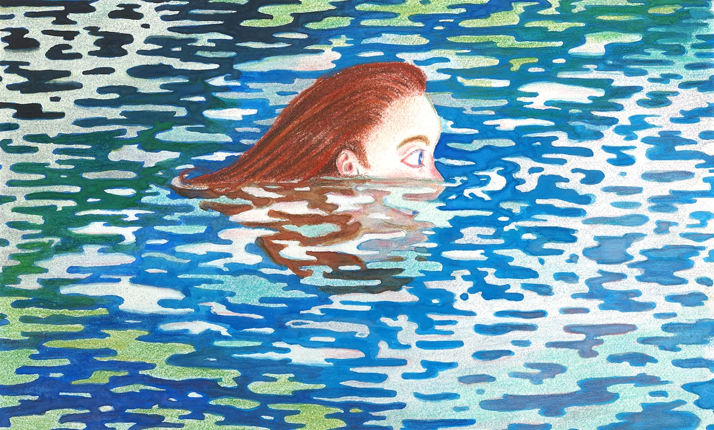 Female head submerged in body of water swimming among reflections.