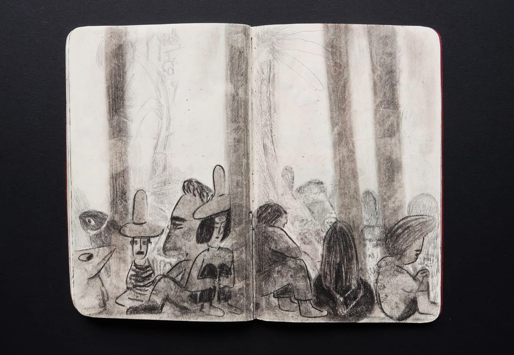 Small sketchbook spread of black and white pencil scene showing imaginary characters sitting down.